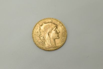 null Coin of 20 Francs in gold with the Rooster (1912).
Weight : 6.45g.
