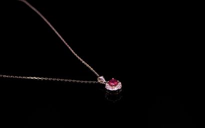 null Silver necklace composed of a pendant centered with a ruby probably treated...