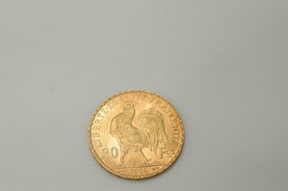 null Gold coin of 20 francs with a rooster (1906).

Weight : 6.45 g - TTB.