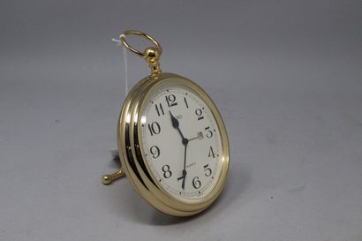 null SEIKO
Desk clock in gilt metal, in the style of a pocket watch, black Arabic...