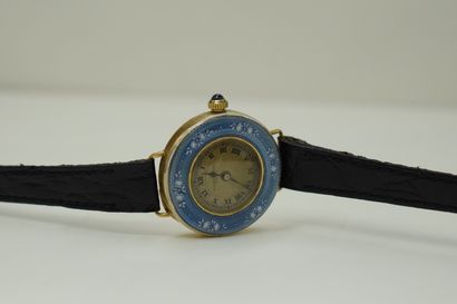 null Ladies' watch, round case in 14K (585) yellow gold with guilloché and blue enamel...