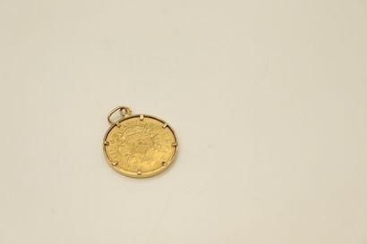 null Pendentif en or jaune 18K (750) retenant une pièce en or de 20 Francs Napoléon...