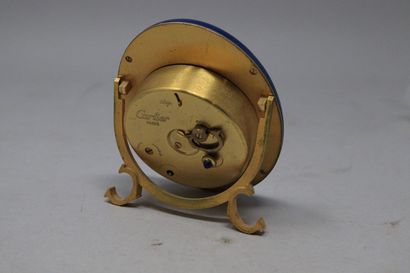 null CARTIER Paris

Gilt brass travel or desk alarm clock with blue enamelled bezel...