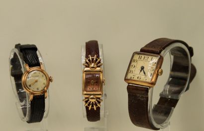 null OMEGA - JUVENIA 
Lot of three 18K (750) yellow gold wristwatches including :...