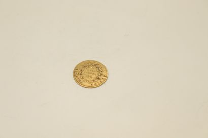 null Gold coin of 10 Francs Napoleon III bare head (1857, A).

Weight : 3.1 g.