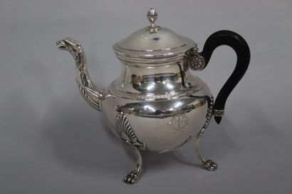 null Silver teapot (950) resting on four claw feet surmounted by palmettes, the spout...
