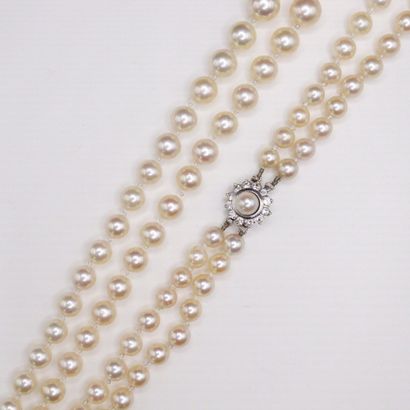 null Necklace of cultured pearls with double row. The clasp is made of 18K (750)...