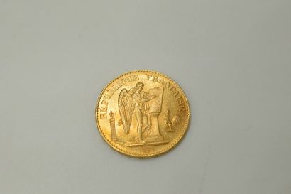 null Gold coin of 20 francs to the Genie (1877, A).
Weight : 6.45g.
