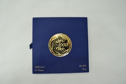 null PARIS CURRENCY 
Lot of five gold coins including : 
- a gold coin of 100 euros...