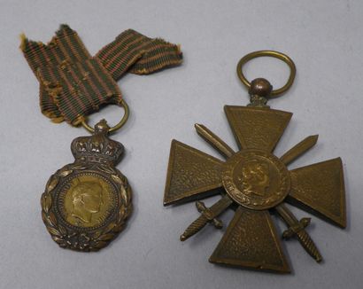 null Medal of Saint Helena, bronze miniature with its ribbon.
We join a war cross...