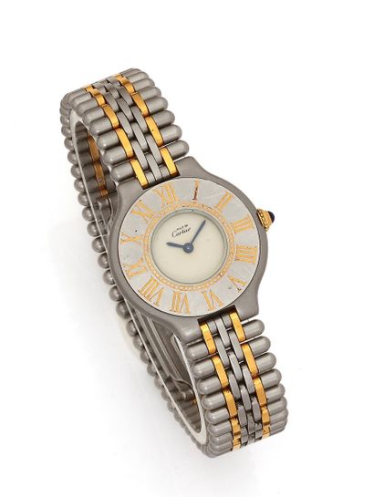 null CARTIER Must 21 
Circa 1980
N° 901092660
Steel and gold-plated ladies' wristwatch,...