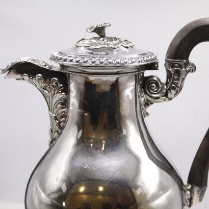 null Tripod silver jug (950) of baluster form. The lid with a border of twisted gadroons,...