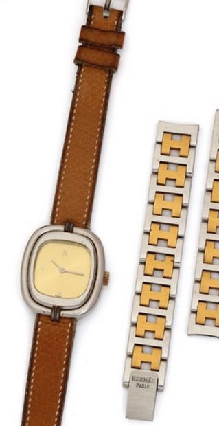 null HERMES About 1980
N° 2896
Ladies' wristwatch in steel, gold dial, hour markers,...