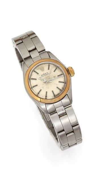 null ROLEX 
Ref 6618
Circa 1970
Ladies' gold and steel wristwatch, white dial (piqué),...