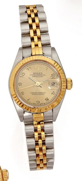 null ROLEX Date-Just 
Ref 79173 
Circa 2000
No. K142856
18k gold and stainless steel...