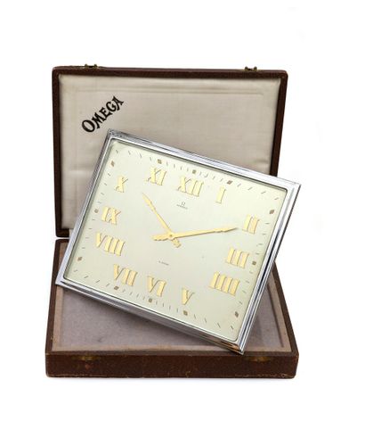 null OMEGA 
Circa 1940
N° 7546242
Steel clock, silvered dial, Roman numeral hour...