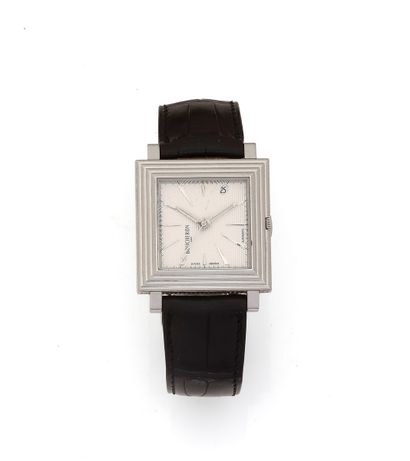 null BOUCHERON 
Circa 2000
No. 110-0287
Men's stainless steel wristwatch, white dial...