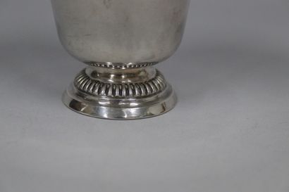 null Silver tulip tumbler, standing on a pedestal with gadroons. Engraved under the...