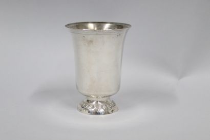 null Large silver tulip-shaped tumbler, standing on a pedestal with foliage moldings....