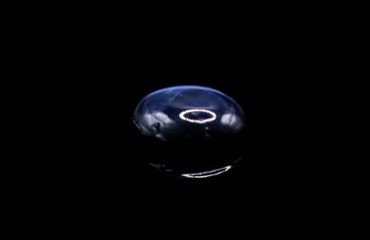 null Star sapphire oval cabochon on paper. 
Rays well visible under the light. 
Weight...