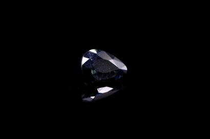 Dark blue pear sapphire on paper.
Weight...