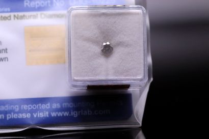 null Round diamond under seal. 

Accompanied by an IGR certificate attesting : 
Color:...