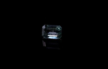 null Rectangular blue sapphire with cut sides on paper.
Probably not heated.
Weight...