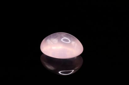 Pink quartz oval cabochon on paper.
Weight...