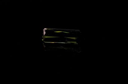 null Rectangular dark green tourmaline with cut sides on paper.
Probably not heated.
Weight...