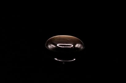 null Black star sapphire oval cabochon on paper.
Rays well visible in the light.
Weight...