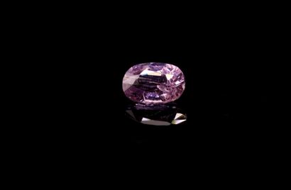 Oval cushion pink sapphire on paper.
Weight...