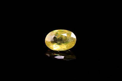 Oval sphene on paper.
Weight : 0.93 ct

Dimensions...