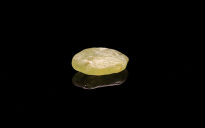 null Green sapphire rough on paper.
Probably not heated.
Weight : 1.44 ct

Dimensions...