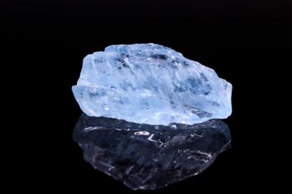 null Aquamarine rough on paper.
Weight : 9.83 cts

Size: 22.6mm x 11.5mm