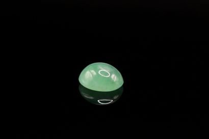 Oval jade cabochon on paper.
Probably untreated,...