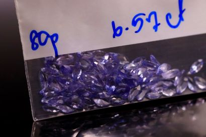 null Mixture of eighty tanzanites shuttles on paper.

Total weight : 6.57 cts

Average...