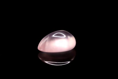 null Pear quartz cabochon on paper. 
Weight : 6.76 cts. 

Dimensions : 4.6mm x 1...
