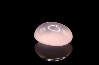 Pink quartz oval cabochon on paper.
Weight...