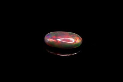 null Black opal cabochon oval on paper.
Weight : 0.75 ct

Dimensions : 9.2mm x 6...