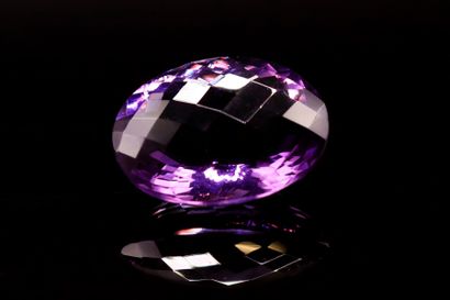 null Important oval amethyst on paper.
Weight : 26.00 cts

Dimensions : 24mm x 2...