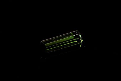 null Green tourmaline baguette on paper.
Probably not heated.
Weight : 0.80 ct 

Dimensions...
