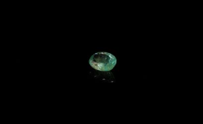 Oval emerald on paper. 
Weight : 0.80 ct....