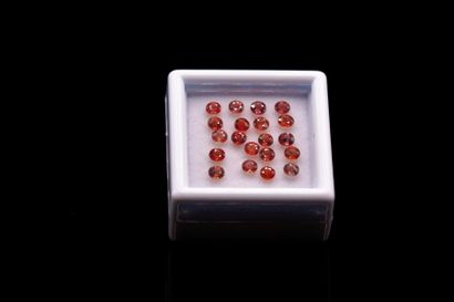 Mix of twenty round orange-pink sapphires...