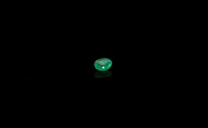 Oval emerald on paper. 
Weight : 0.56 ct....