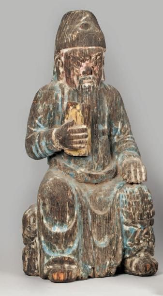 null Important sujet en bois polychrome représentant une divinité du Tao tenant dans...