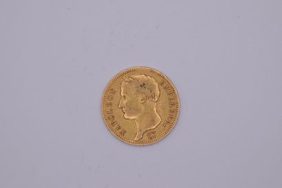 null Gold coin of 40 Francs Napoleon I Laurée, (1811, Paris).
Weight : 12,88 g. 
VG...