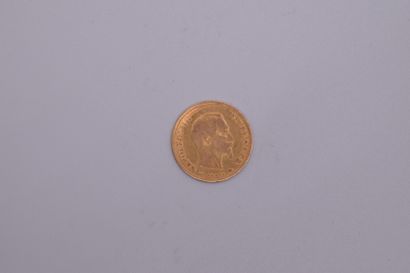 null Gold coin of 10 Francs Napoleon III bare head (1858).
Weight : 3.19 g.