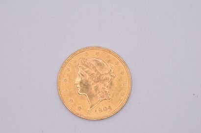 null Gold coin of 20 dollars "Liberty" (1904).
Weight : 33.43 g.