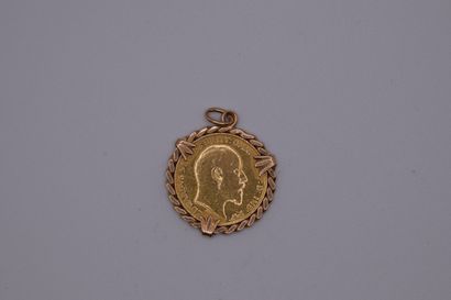 null Sovereign in gold Edward VII (1903) mounted in 18K (750) gold pendant.
Weight...