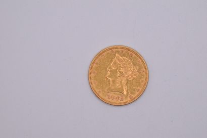 null Gold coin of 10 Dollars Coronet Head - Eagle (1882).
Weight : 16.71g.